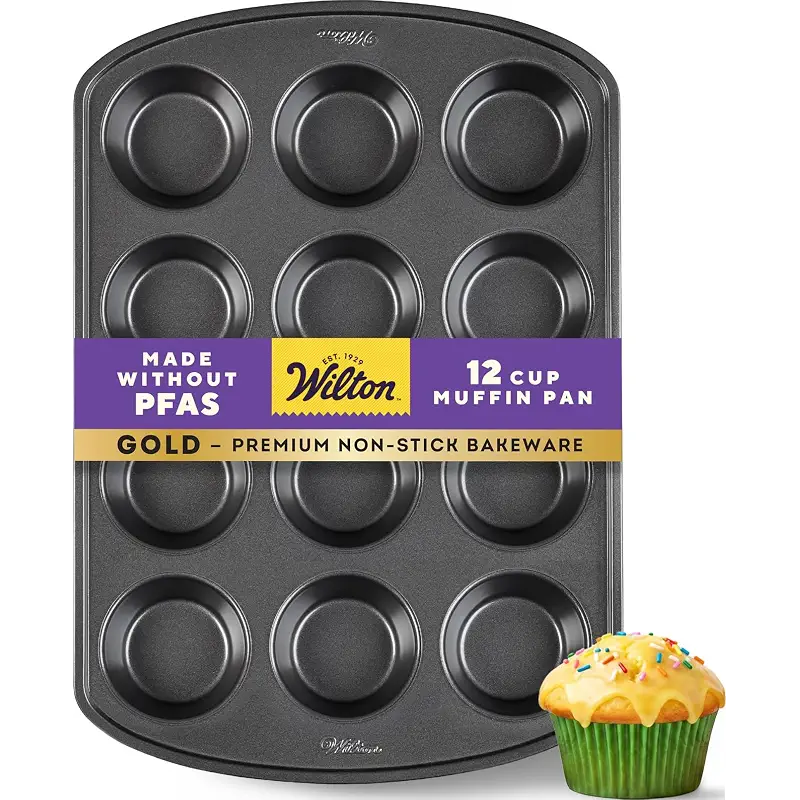 Wilton Gold Non-Stick Muffin Pan, Made Without PFAS, 12-Cup | Non-Stick Steel with Scratch-Resistant Coating, Resists Warping, Extended Handles, Dishwasher Safe, Perfect for Cupcakes